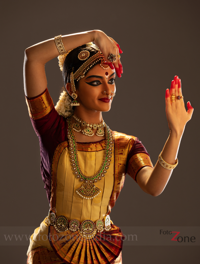 Bharatanatyam dancer performing traditional mudras